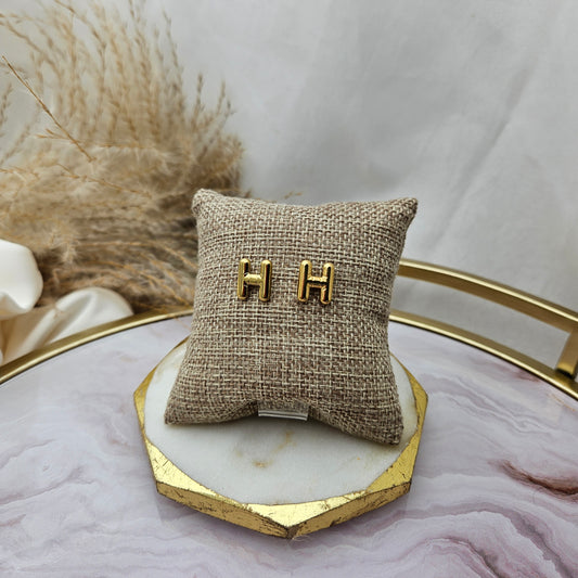 Establecer letra inicial H