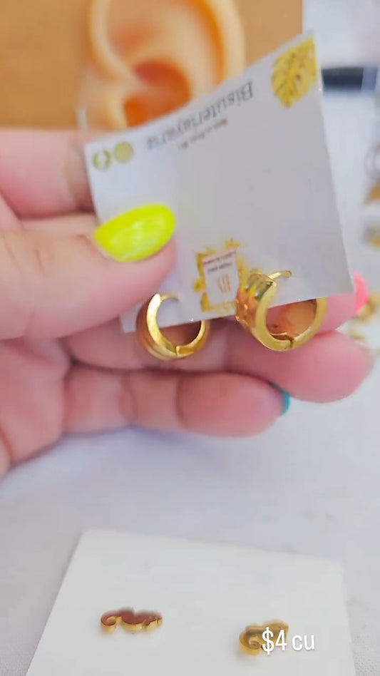 Huggies en acero inoxidable